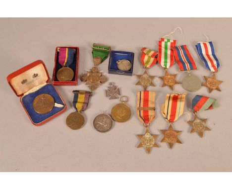 A collection of WWII medals, comprising two Africa Stars (one with 1st Army clasp), The France and Germany Star, 1939-45 Star