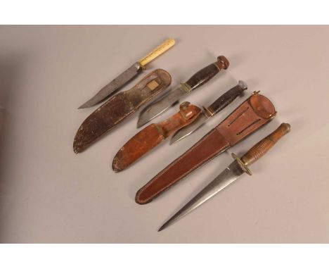 A Bone handled knife by Brookes &amp; Crookes, together with a WWII Fighting knife, with Kabar scabbard, another fighting kni