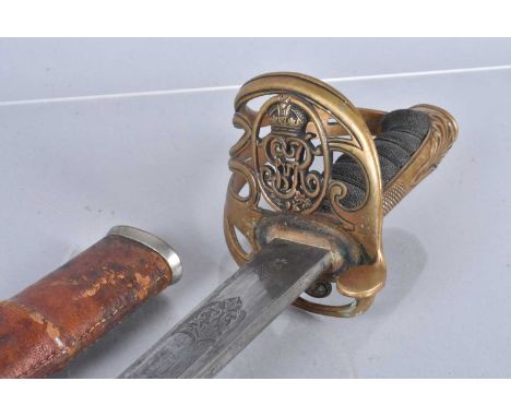 A George V Royal Army Medical Corps 1892 Pattern Officer's Sword, by Clement Gray, brass guard, etched blade, with leather bo