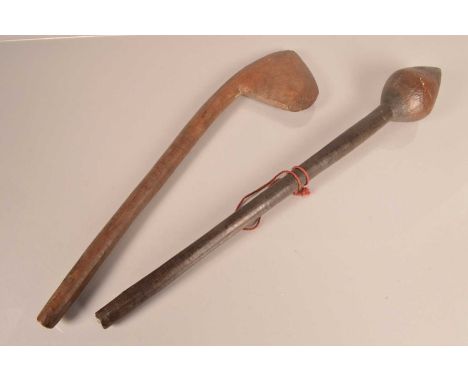 Two African Wooden War Clubs, one in the form of a Knobkerrie with a pointed top, 63cm, the other with a triangular style hea