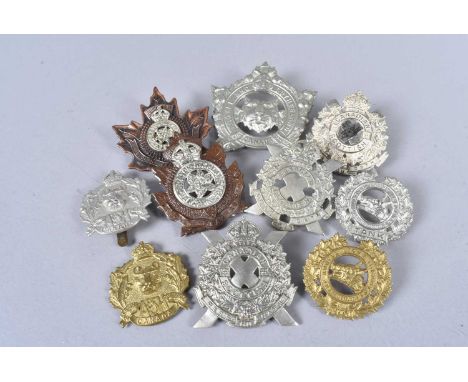 Canada, a collection of Canadian cap badges, including three Argyll &amp; Sutherland Regiment of Canada, (one missing a slide