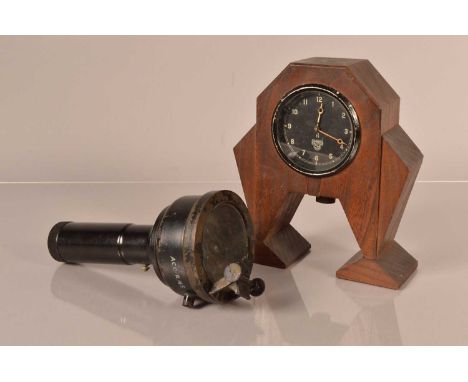 An Aviation Type 06A hand held compass, together with a Smiths Dash clock, in later made mantle stand (2)