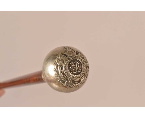 A George V Royal Engineer swagger stick, the shaft made of zebra/malacca wood, with white metal spherical top, with Royal Eng