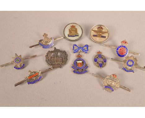 A group of silver and enamel Regimental sweetheart brooches, comprising Wiltshire Regiment, Royal Air Force, Scots Guards, RE