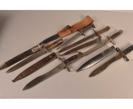 An assortment of various World Bayonets, to include two Spanish Bolo bayonets with scabbards, a Spanish 1893 with scabbard, a