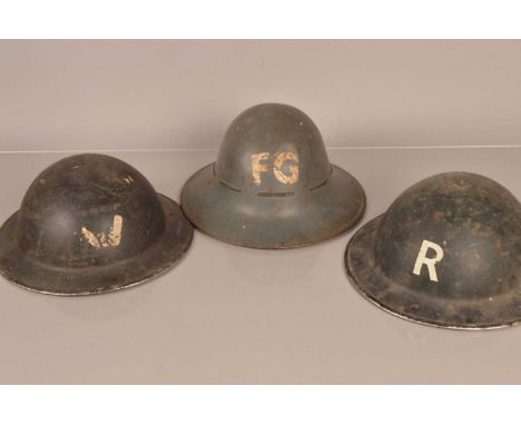 A WWII Rescue Organisation Brodie Helmet, having white painted R to front and back, dated 1939, together with another brodie 