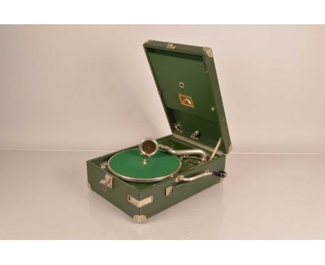 Portable gramophone, an HMV Model 101L, in green case, No. 1010024586, with Harrods label No. 37229 (motor runs, case in good