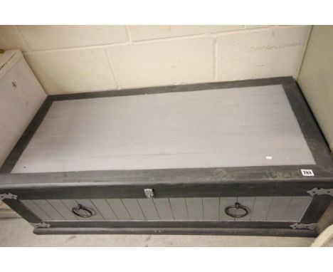A Black and Grey Painted Trunk 