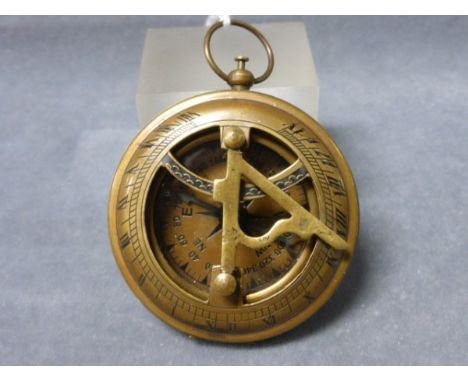 A Brass Cased Compass and Sundial 