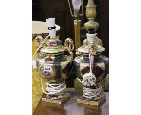 A Pair of Ceramic Urn Table Lamps, Painted Wooden Table Lamp with shade and a Mahogany Standard Lamp 