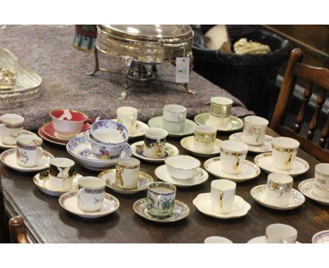 A Group of 17 Cabinet Coffee Cans and Saucers including Royal Doulton, Coalport, Noritake, Japanese plus Wedgwood Trio and a 