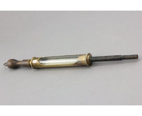 A Vintage Brass 'Hot Metal' Thermometer with wooden handle 
