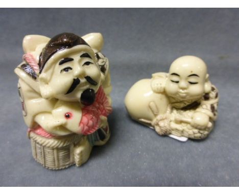 Two Netsuke including Boy Buddha and a Fisherman 