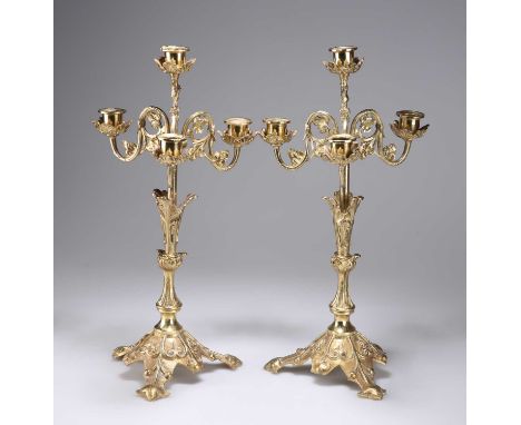 A PAIR OF GILT-BRASS FOUR-LIGHT CANDELABRA, 20TH CENTURY each with leaf-clad scrolling branches. (2) 41cm high