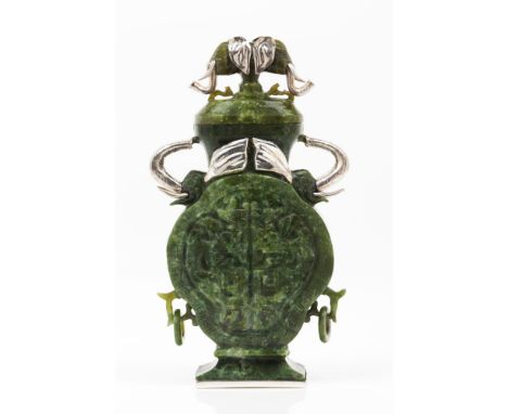 A vaseSpinach green jadeCarved body with Oriental symbols and two elephant head shaped handles od applied silver elementsCove