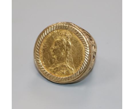 A 9ct gold ring set with a Victoria gold full sovereign, size K.