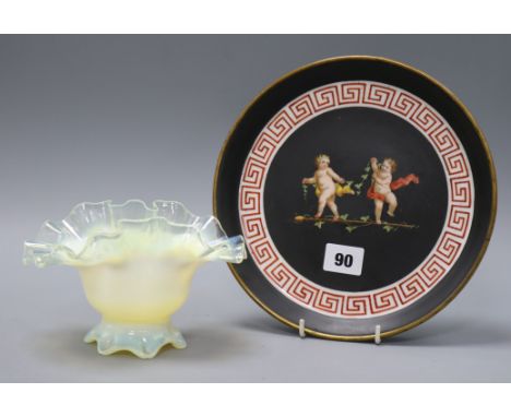 A Vaseline glass vase and a ceramic dish decorated with cherubs dish diameter 23cm