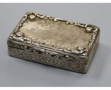 A Victorian engraved silver table snuff box, Cronin &amp; Wheeler, Birmingham, circa 1850, no dale letter, (tired), 86mm.