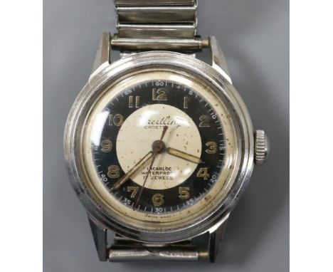 A stainless steel Breitling Cadette mid size manual wind wrist watch.