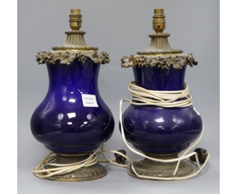 A pair of Louis XV style gilt metal mounted dark blue ceramic table lamps height 40cm