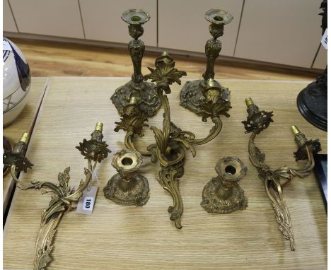 A pair of gilt candlesticks with insect design, a pair of gilt two branch wall lights, another three branch wall light etc ta