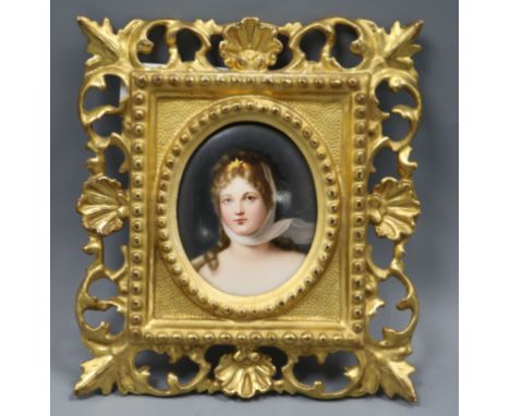 A porcelain oval portrait plaque, in gilt frame