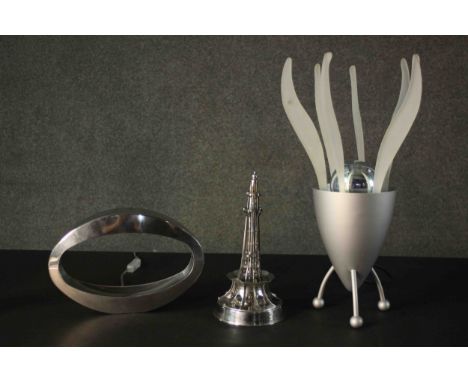 Three chrome lamps including, an oval polished finish lamp and a vintage Eiffel Tower lamp.  H.51 Dia.20cm. 