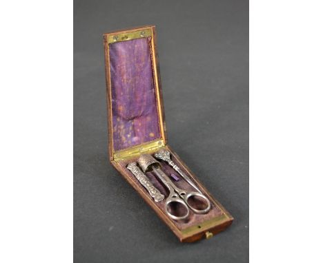 A mahogany and marquetry Victorian sewing kit with silver thimble, steel scissors, white metal needle case and darning tool. 