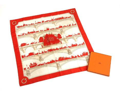 A vintage Hermès silk scarf, 'Les Ponts de Paris', by Hugo Grygkar, 1953, cream ground with red border and design, highlighte