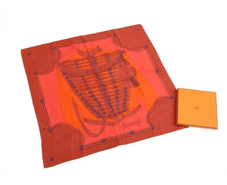 An Hermès silk scarf, 'Brandebourgs', by Caty Latham, 1972, red ground with orange military jacket, red and blue detailing, w