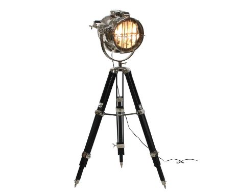 A large aluminium 'nautical' light on stand