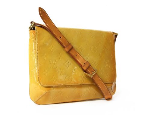 A Louis Vuitton yellow monogrammed Vernis leather 'Thompson Street' bag, vachetta leather flat handle, gold-tone hardware, op