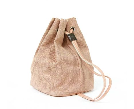 A Gucci pink monogrammed canvas mini drawstring backpack, pink leather straps, ruthenium hardware, serial number 039 - 0973 0