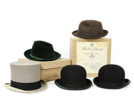 A Herbert Johnson black bowler hat, boxed, a vintage Herbert Johnson bowler hat, boxed, a Herbert Johnson brown trilby hat, b