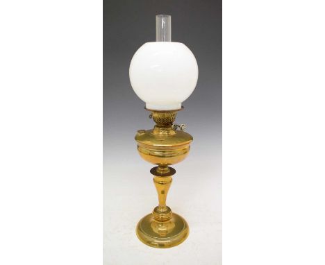 A paraffin/oil pendant lamp and a pedestal table lamp, 70cm high and smaller