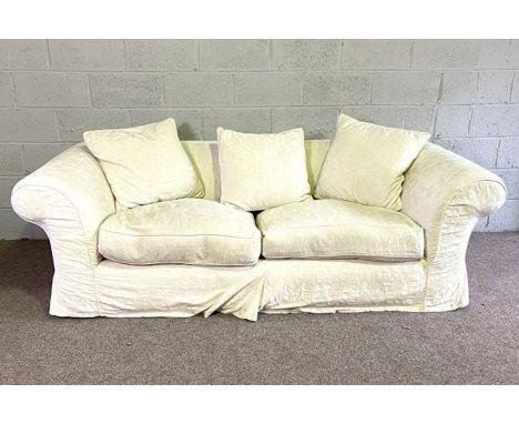 A large Chesterfield style three seat sofa, modern, with white cotton loose cover, 230cm long