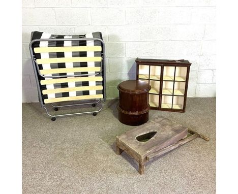 A selection of furniture, including a small wall mounted china cabinet, with two glazed doors; a vintage boot jack; a small m