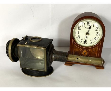 A small Regency style mantel clock, with arched case, 26cm high; together with brass and painted coach lantern (2)