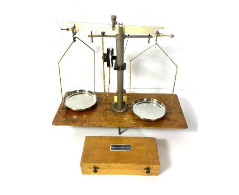 A vintage George & Bekker Balance Scale, in a glazed case, 46cm wide; together with a Griffin & George Limited cased set of p