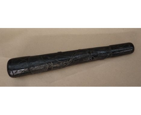 An Irish bog oak truncheon carved with shamrocks, harp and crosshatching, 38cm long