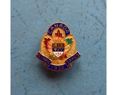 A 1932 Los Angeles Olympic Games enamel pin badge for Canada with maple leaf and central coat of arms    CONDITION REPORT:  P