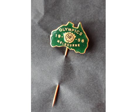 A 1956 Melbourne Olympic Games pin badge in the form of Australia in green enamel   CONDITION REPORT:  Provenance - Ernest Ja