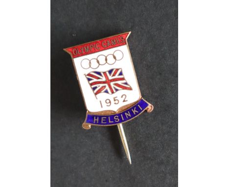 A 1952 Olympic Games Helsinki pin badge of shield shape with a white background and Union Flag   CONDITION REPORT:  Provenanc