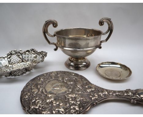 An Edward VII silver twin handled trophy cup, with a ring turned body on a spreading foot, London, 1908, Charles Boyton & Son