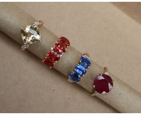 A Gemporia Xia Heliodor & White Zircon 9K Gold Ring together with a Madagascan Ruby & Diamond 9K Gold Ring and two other 9ct 