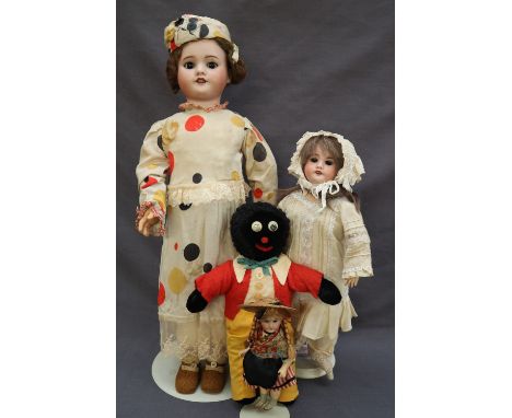 A Société Française de Fabrication de Bébés et Jouets bisque head doll, with weighted brown eyes, painted eye brows, open mou