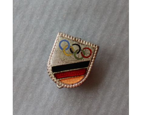 Olympic Games, a German competitors badge of shield shape    CONDITION REPORT:  Provenance - Ernest James Henry (Billy) Holt,