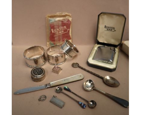 Three silver napkin rings together with a silver bladed and mother of pearl pocket knife, Ronson lighter etc, approximately 9