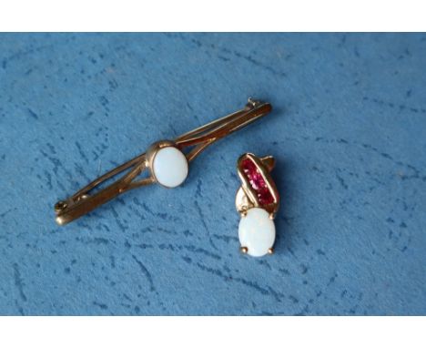 A 9ct yellow gold opal set bar brooch together with a 9ct gold opal and ruby set pendant, overall approximately 4 grams
