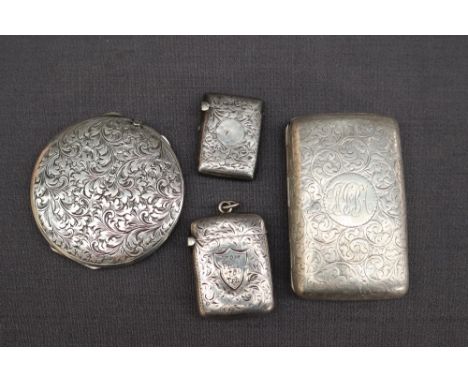 An Edward VII silver cigarette case of rectangular form with scrolling leaves, Birmingham, 1903 together with two silver vest